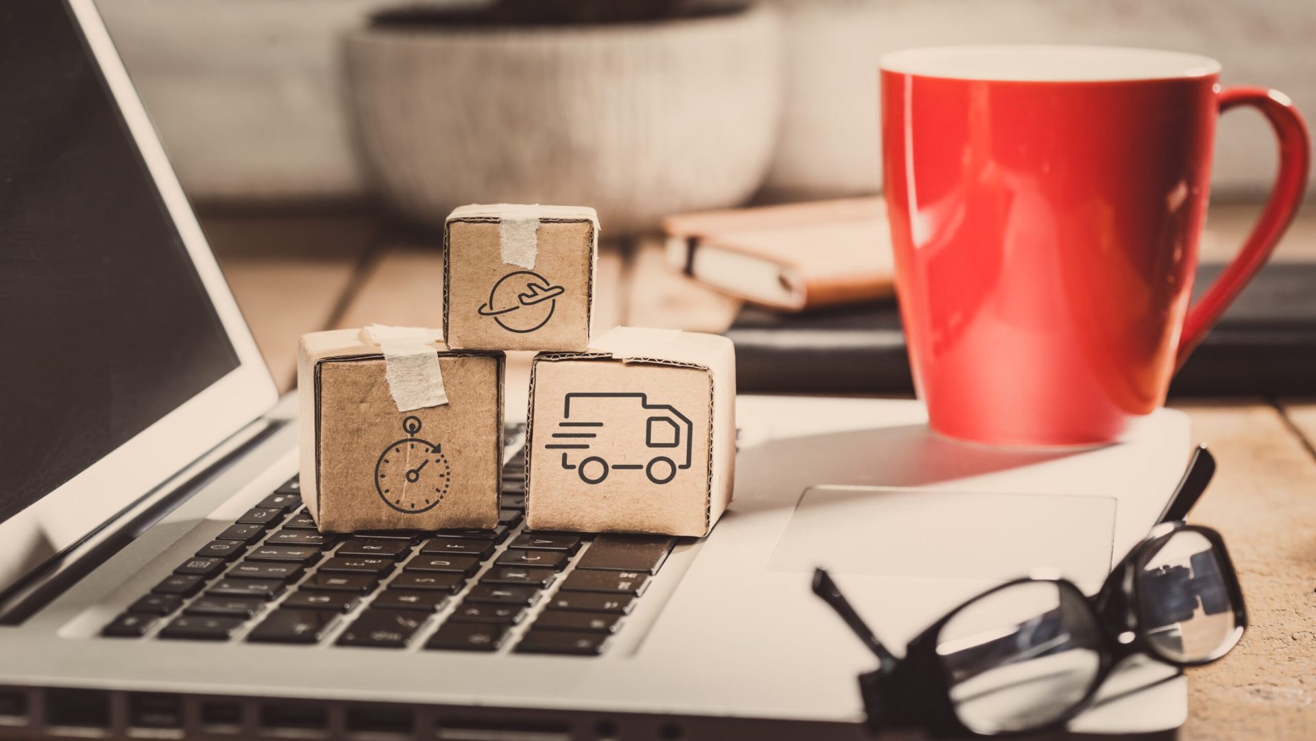 Global logistics concept with online trading and shopping in the internet, packages to be delivered after ordering on the computer